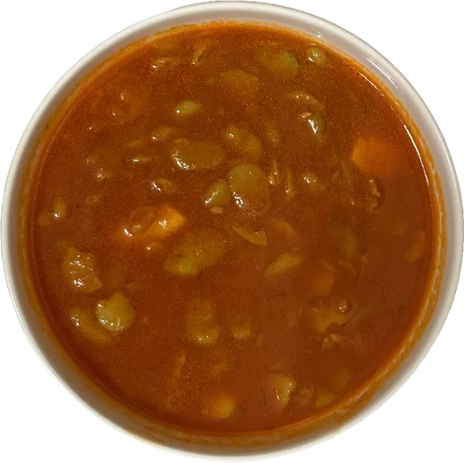 A bowl of Nakha Foods Green Fava Stew